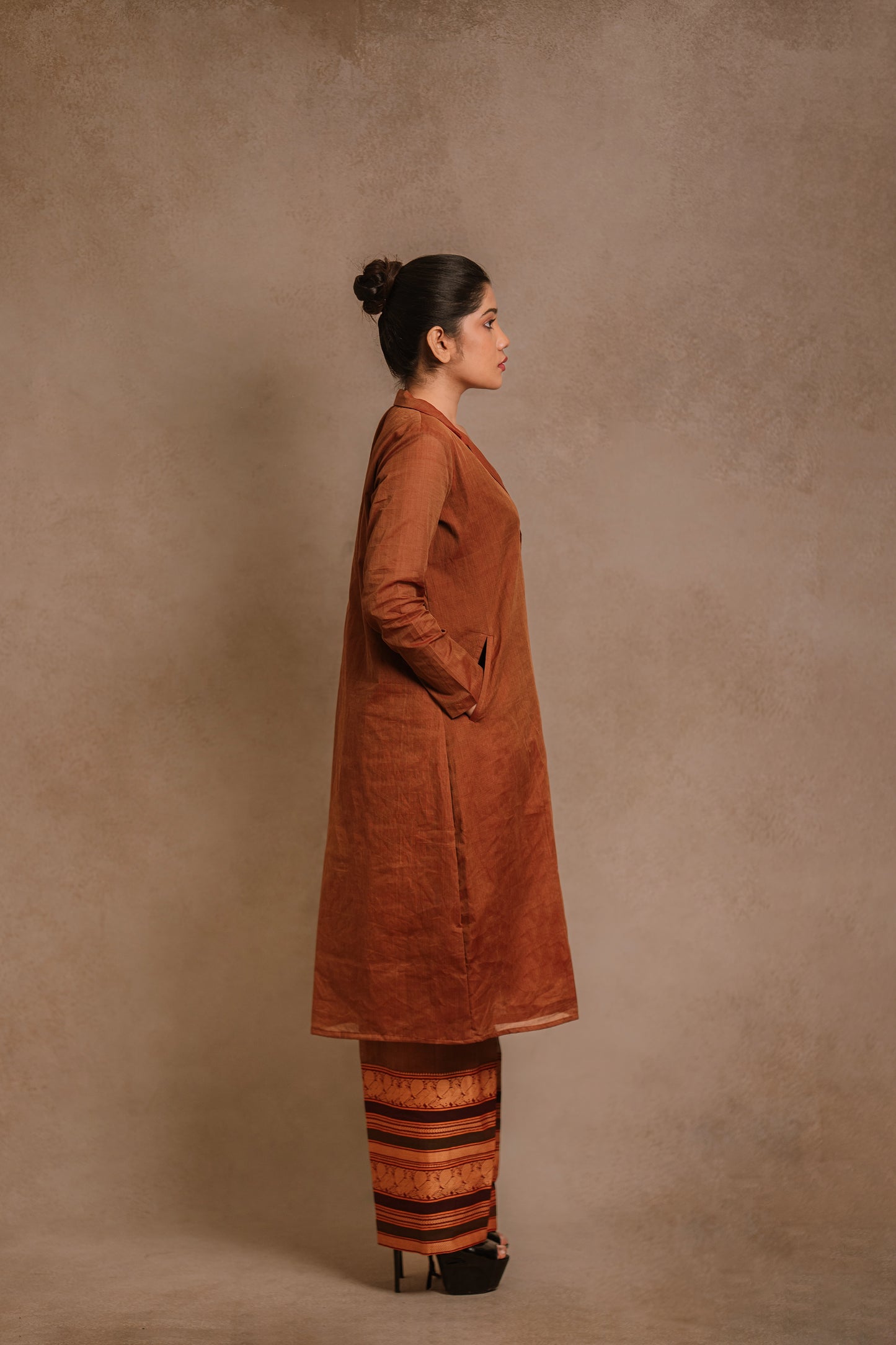 Model Jaina Parmar posing for photoshoot in a brown co-ord set by team AKloset.
