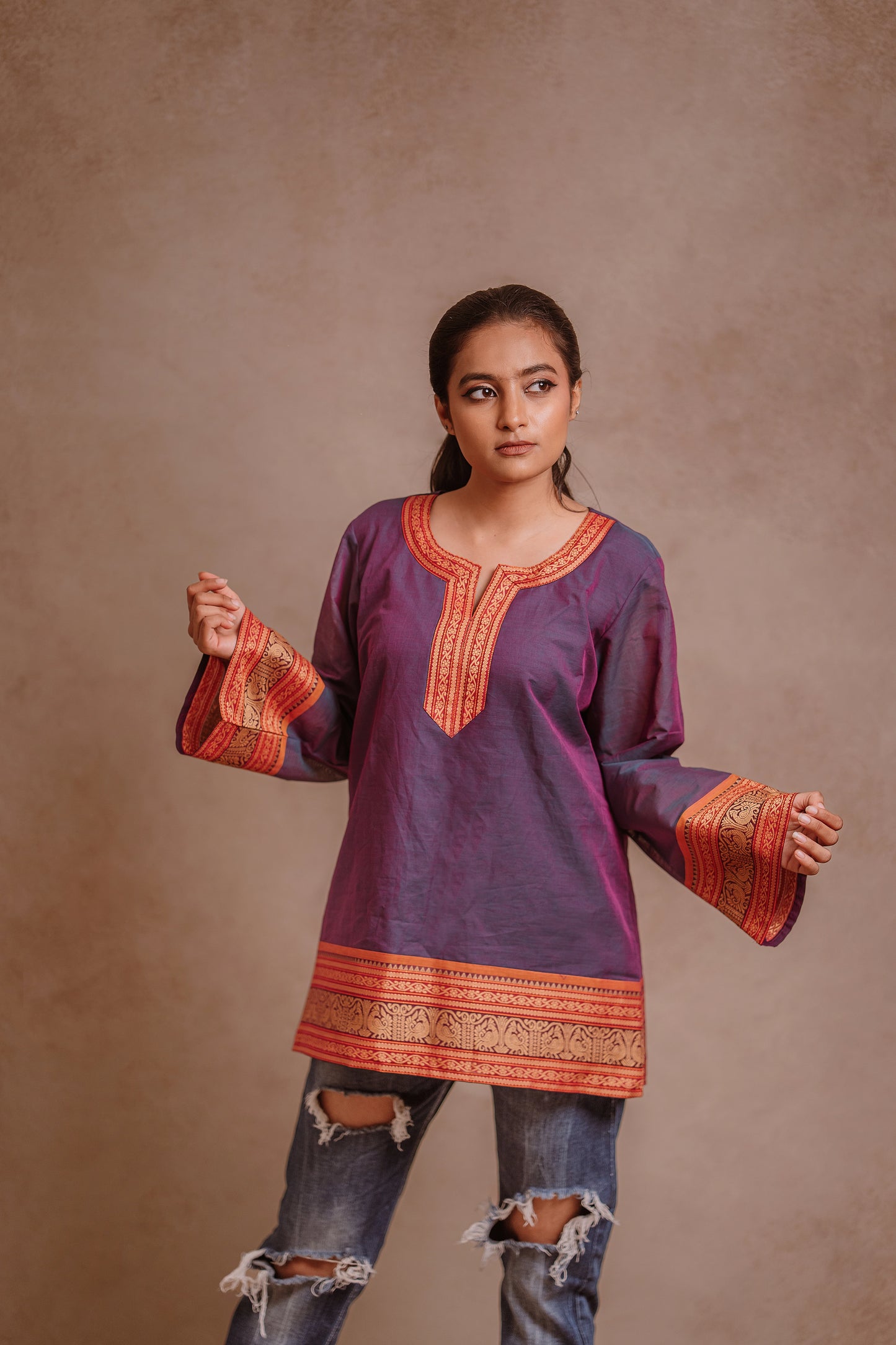 Model Krisha for photoshoot in a blue (dual tone fabric) oversized top with bell sleeves by team AKloset.