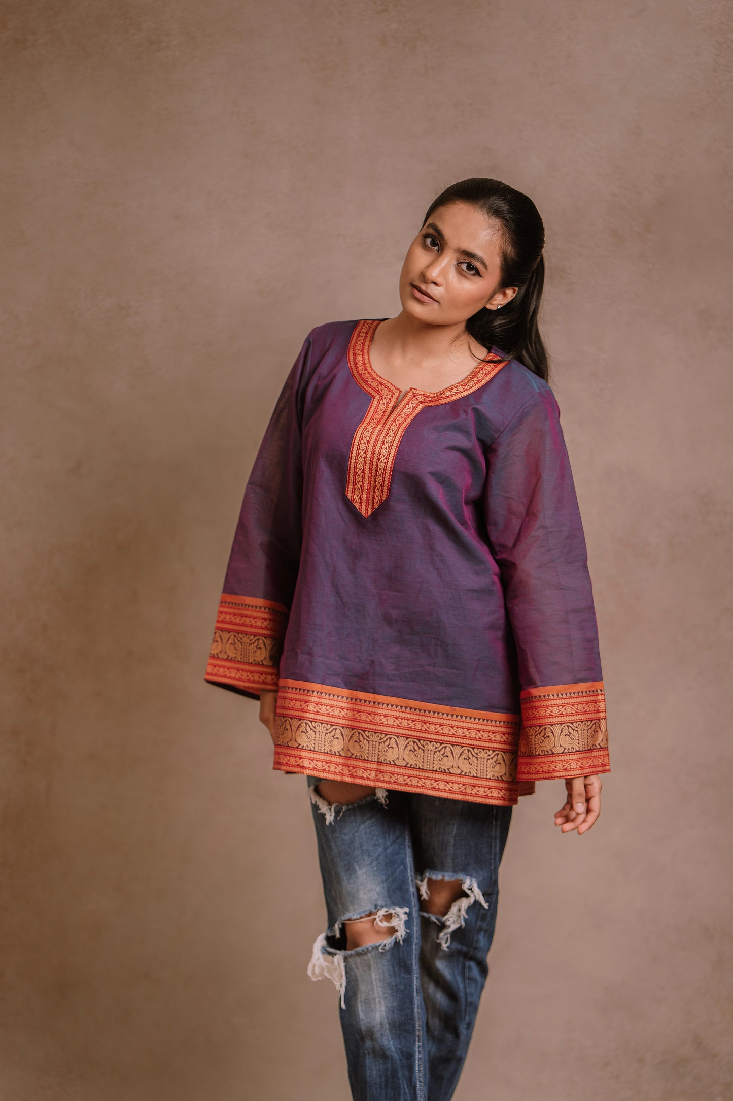 Model Krisha in a blue (dual tone fabric) oversized top with bell sleeves by team AKloset.