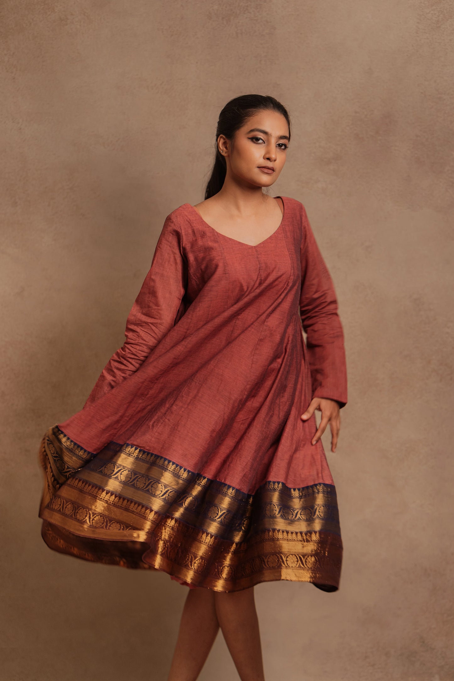 Model Krisha in a kalidar dress in onion pink by team AKloset.