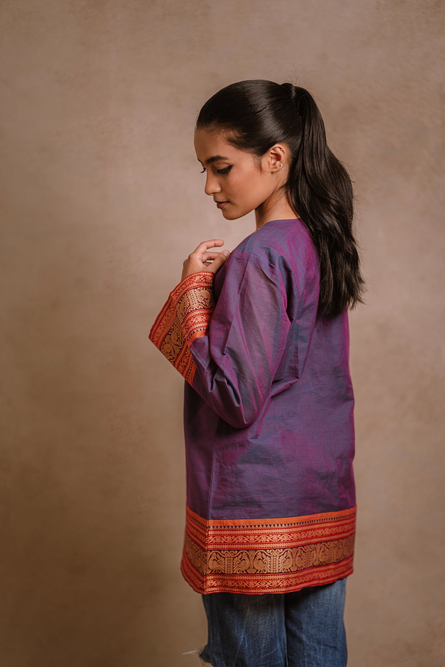 Model Krisha posing in a blue (dual tone fabric) oversized top with bell sleeves by team AKloset.