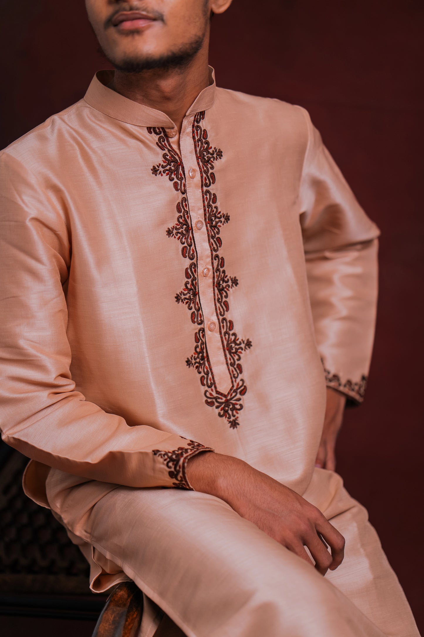 Model showcasing details in a light pink kurta with intricate embroidery by team AKloset.